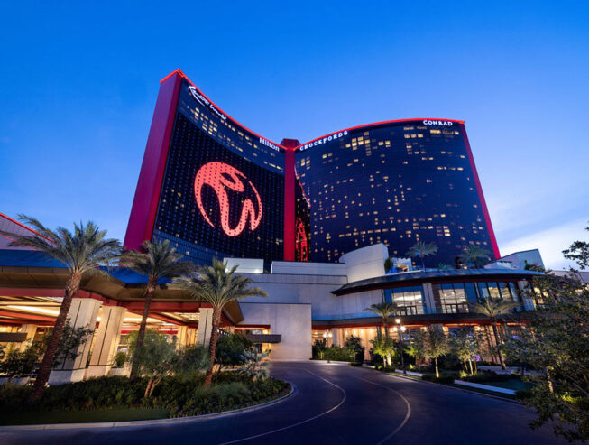 Illuminated landscaping outside of Resorts World Las Vegas