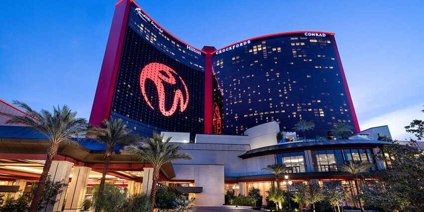 Illuminated landscaping outside of Resorts World Las Vegas