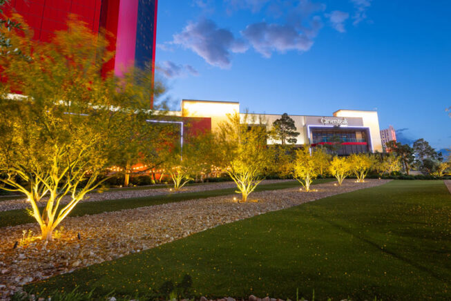 Illuminated landscaping outside of Resorts World Las Vegas