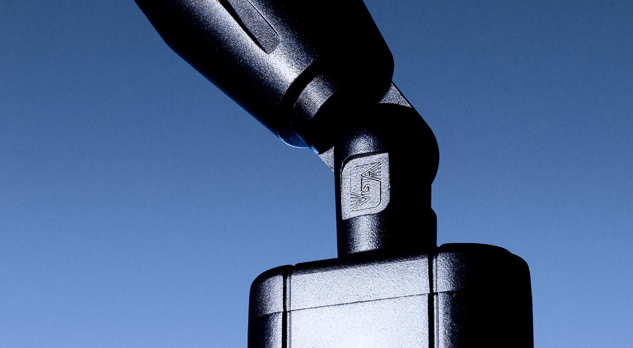 A photo showcasing Vista Professional's infinity knuckle mount on an exterior light fixture.